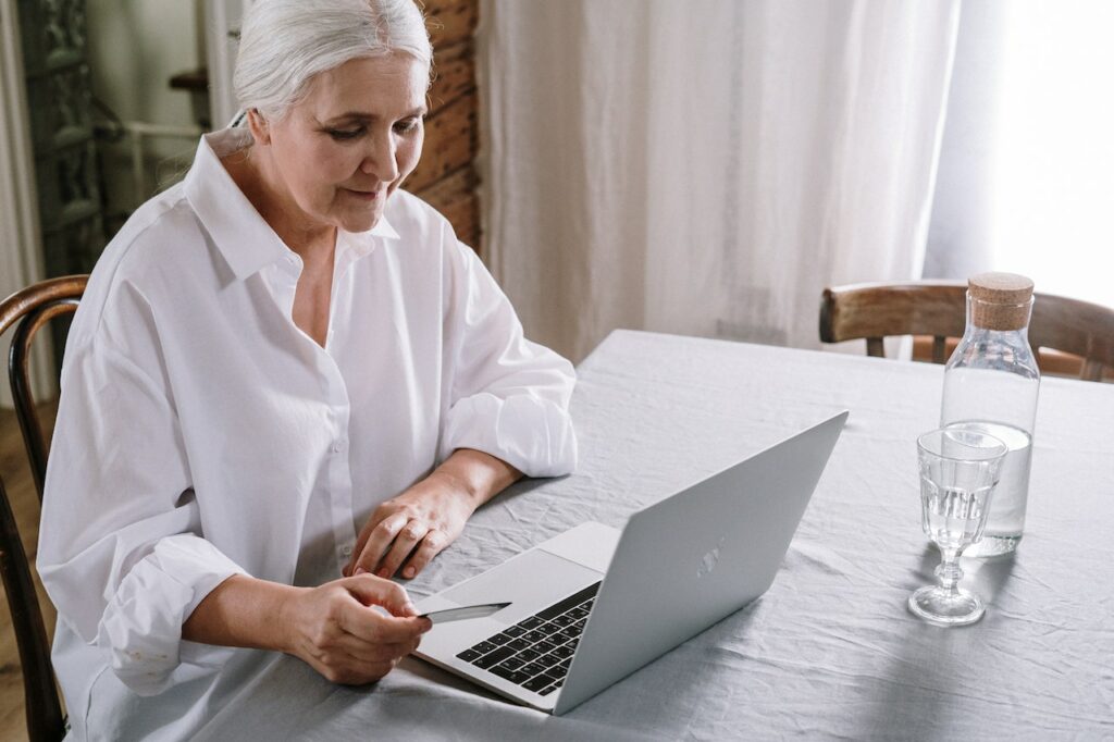 elderly using laptop